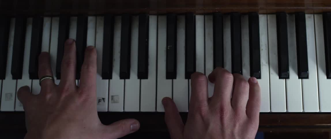 A person is playing the piano