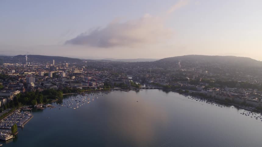 City at daytime next to a large body of water