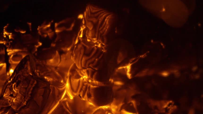 Embers are burning in a bonfire