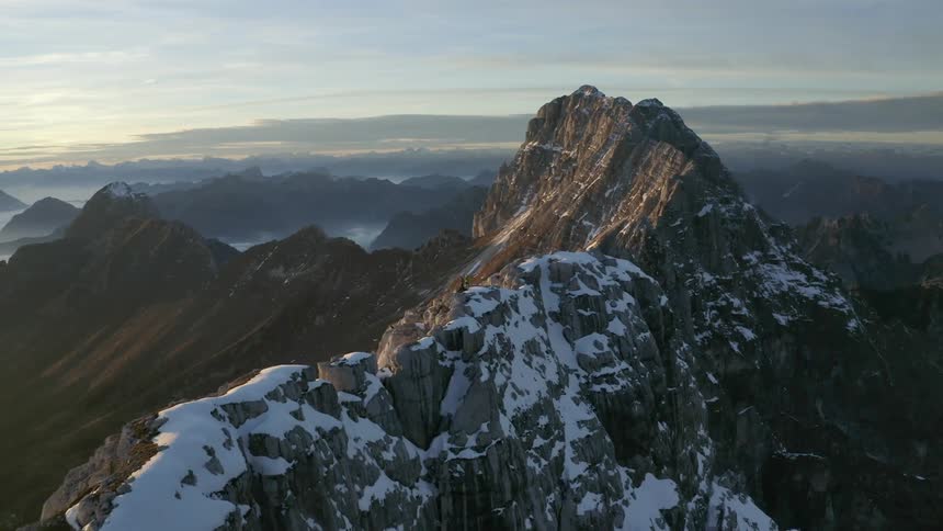 Aerial view of a man and woman on top of a mountain