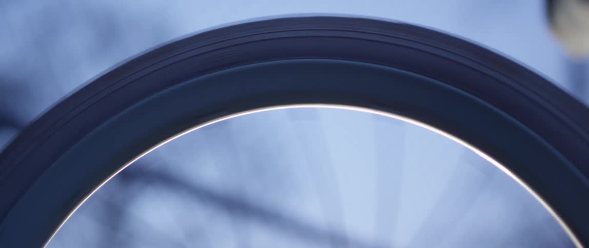 Hand spinning a tire on a bike outdoors