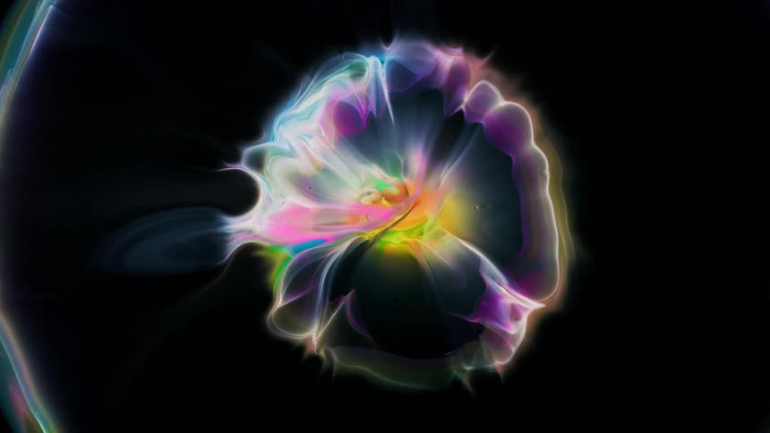 Green black yellow blue and purple colors that look like a ball of electricity