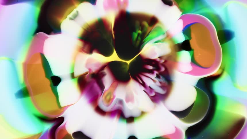 Psychedelic blooming colorful liquid ink spreads blossoming outwards in patterns
