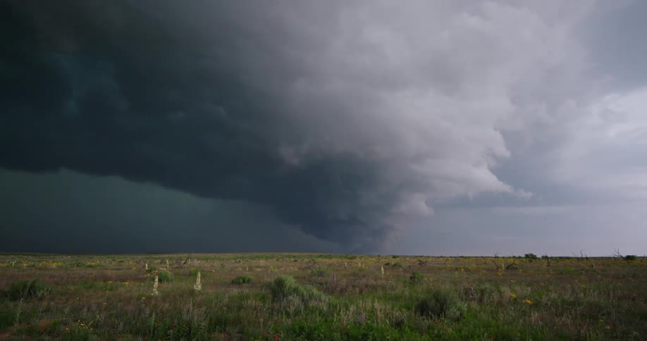 Time lapse looking straight into a convective and powerful supercell severe thunderstorm as it swirls and churns straight towards camera