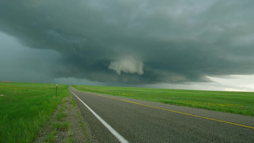 Time lapse of a rotating and ominous super cell severe weather thunderstorm in rural Wyoming