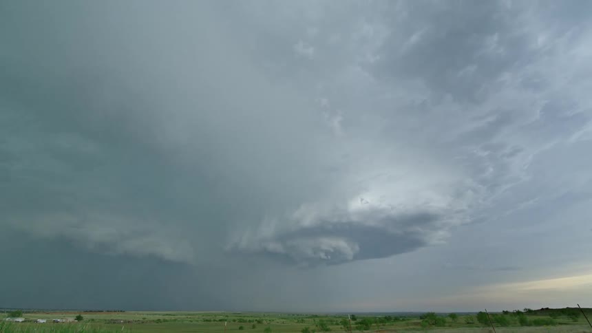 Time lapse of two super cell thunderstorms colliding with each other with the massive rotation clearly visible as huge bolts of lightning strike earth