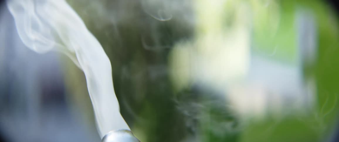 Exhaust pouring out of a tail pipe