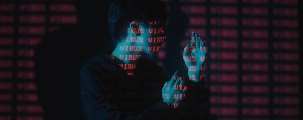 A man is standing in a room and theres text around him