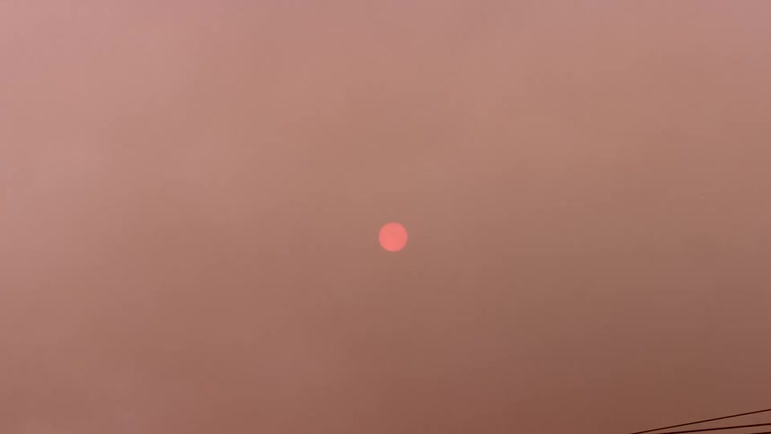 Sun eclipsed in the sky