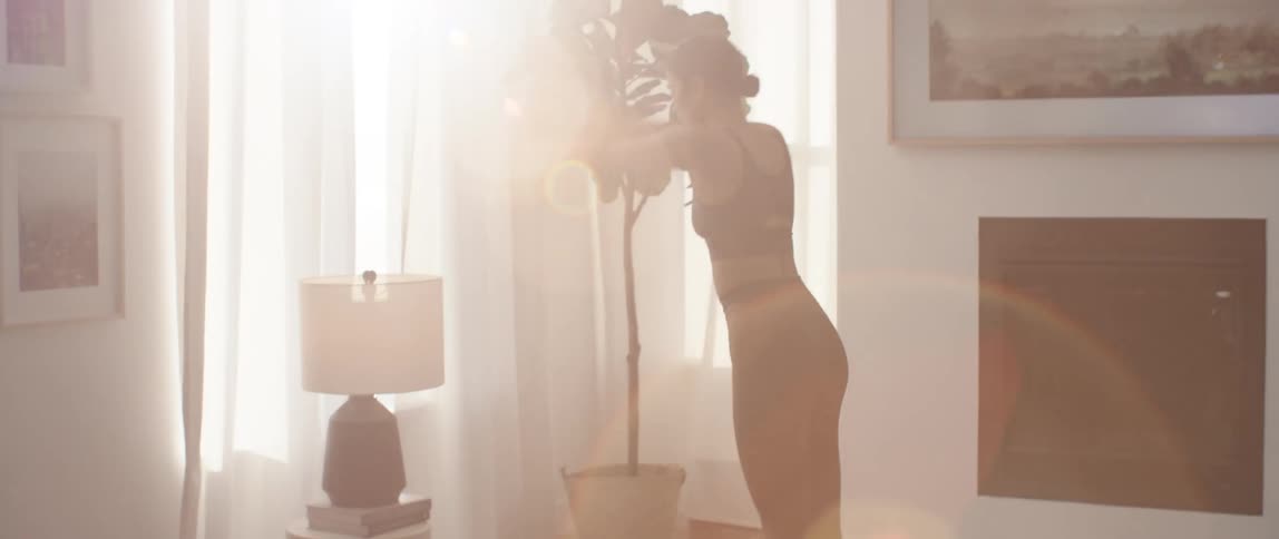 A woman exercising at home