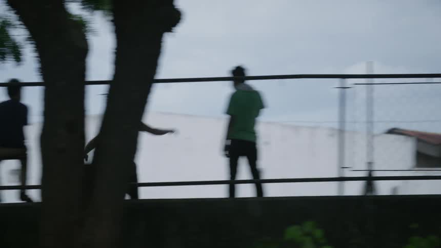 A group of men skateboarding