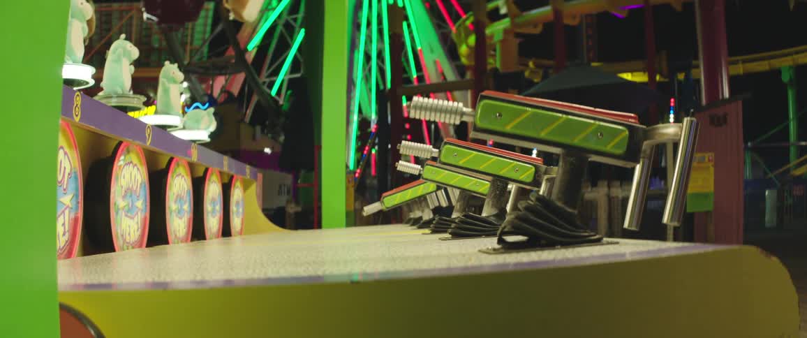 A close up of play guns for an arcade game