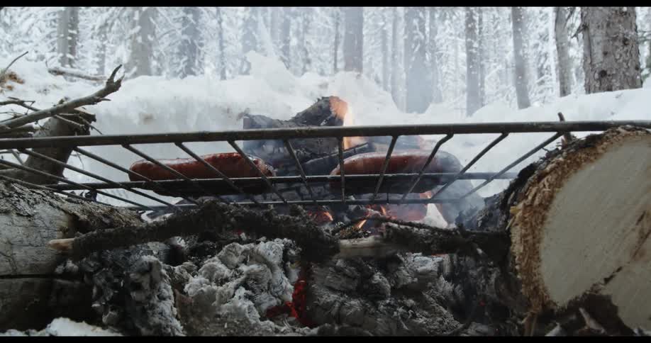 A bonfire is outdoors in winter