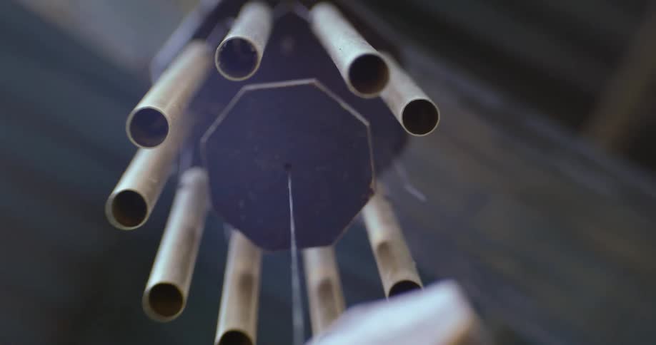 A shot of the underside of wind chimes