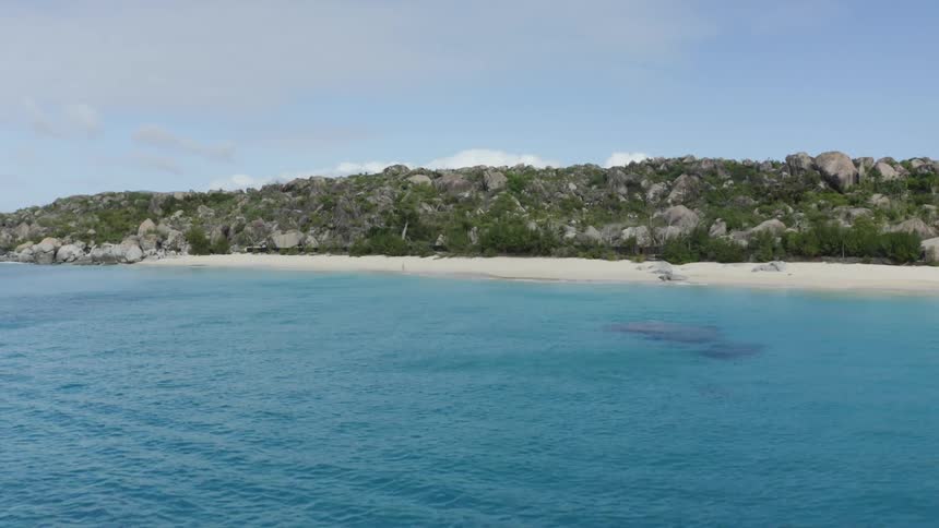 An aerial view of the water and beach