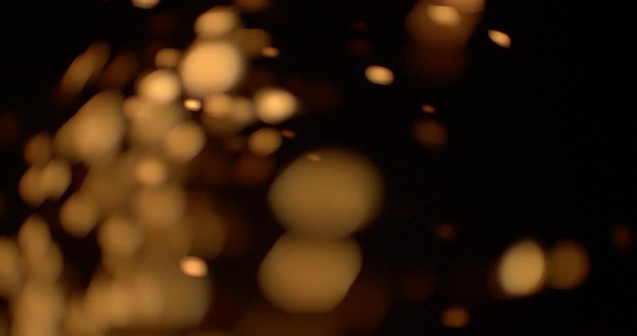 Yellow sparkler popping around in the air