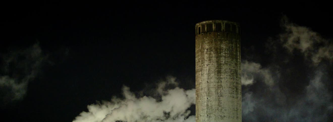 A time lapse of clouds passing over a tower