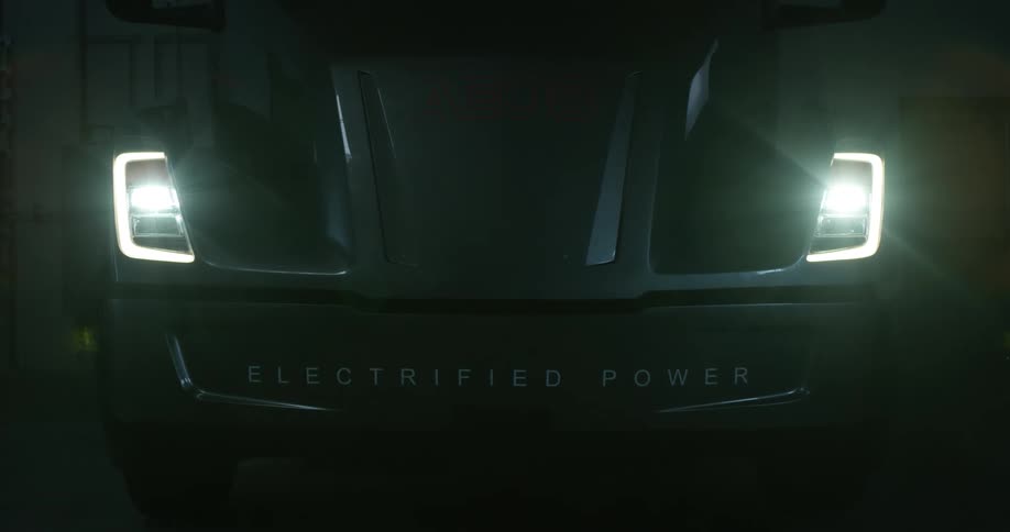 Headlights on a car with the words electrified power on its bumper