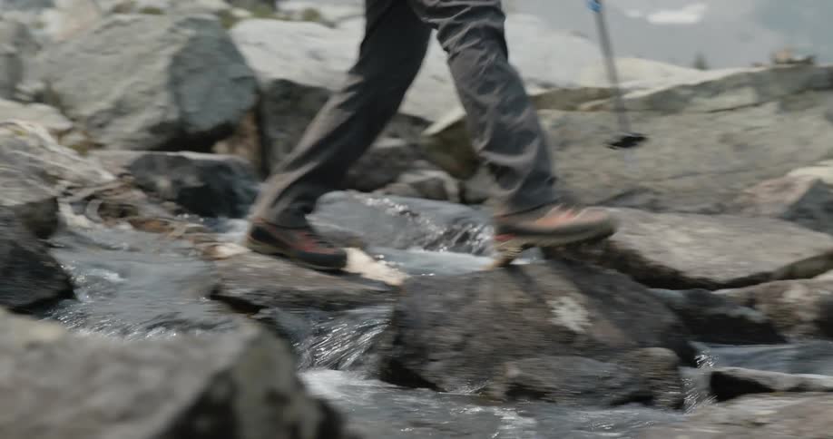A man is hiking outdoors in spring