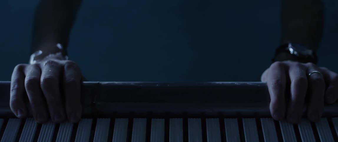 A person is swimming in the pool