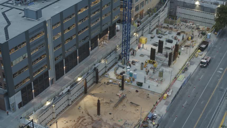 Looking down into the below ground foundation pit of a new building under construction