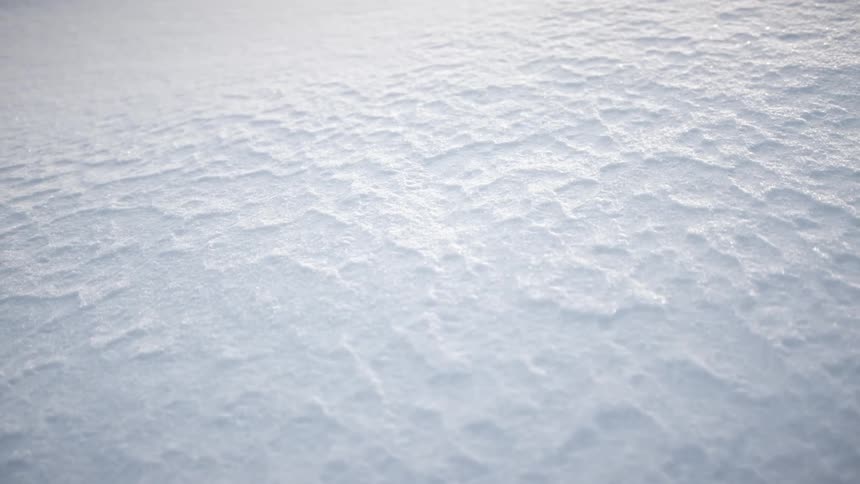 An aerial view of a snow covered landscape