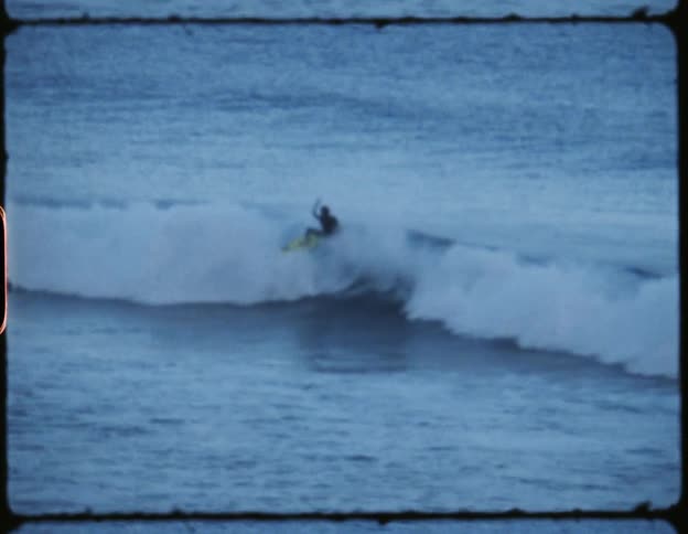 A person is wiping out on a wave in the ocean