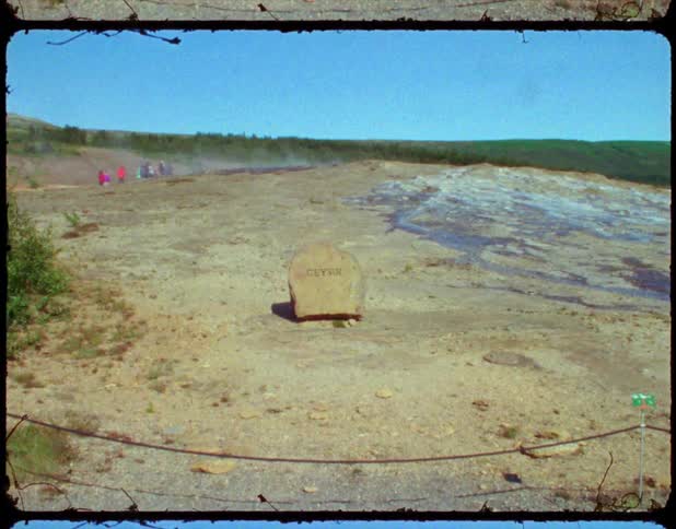 A vintage film of people visiting geysir