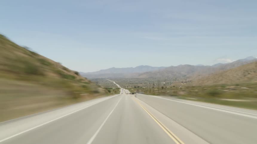 A timelapse of a cars driving down a highway