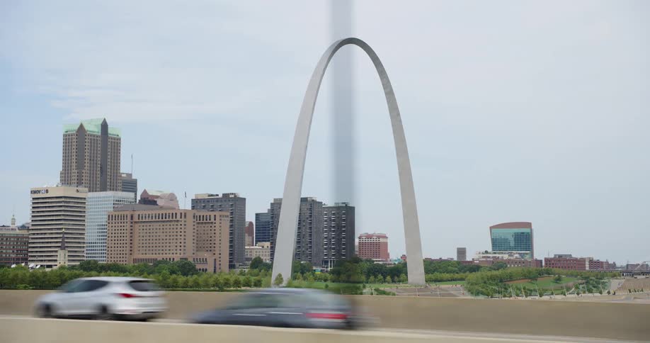 Cars are driving on a highway in spring