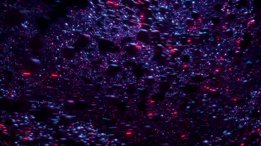Balls in metallic blue and purple with red lights move in tandem