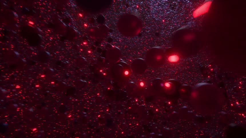 Millions of floating red and black particles that are still or moving