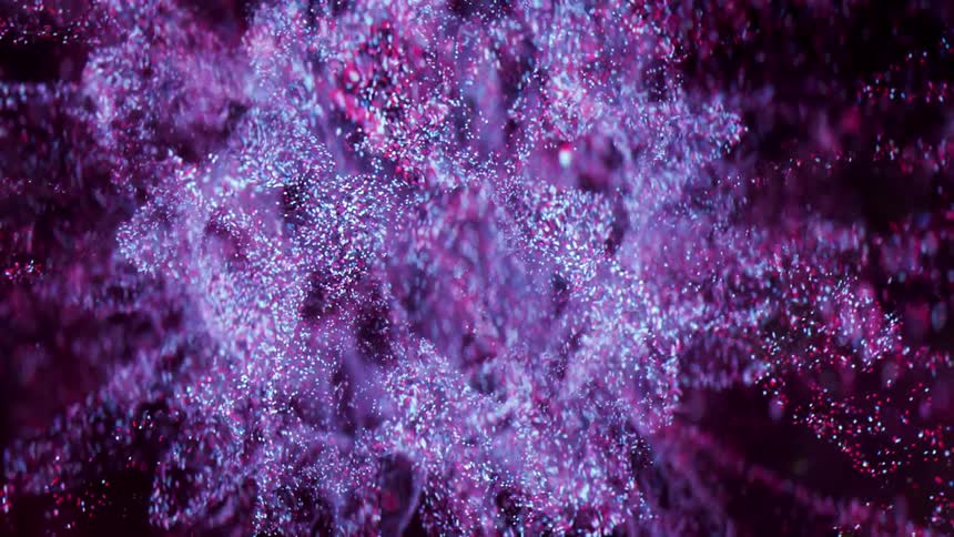 Abstract footage of bubbles and particles in liquid