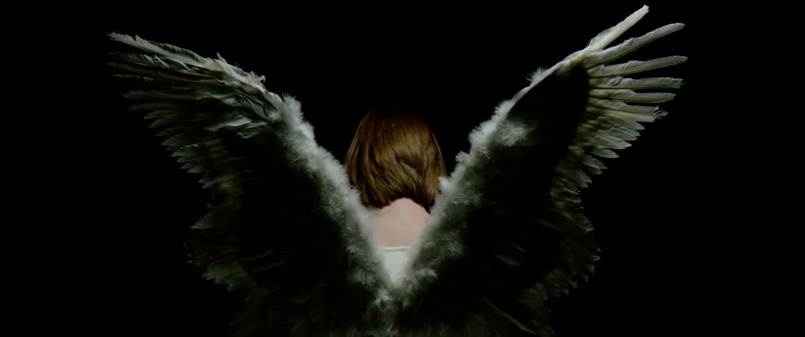 A woman with wings on her back