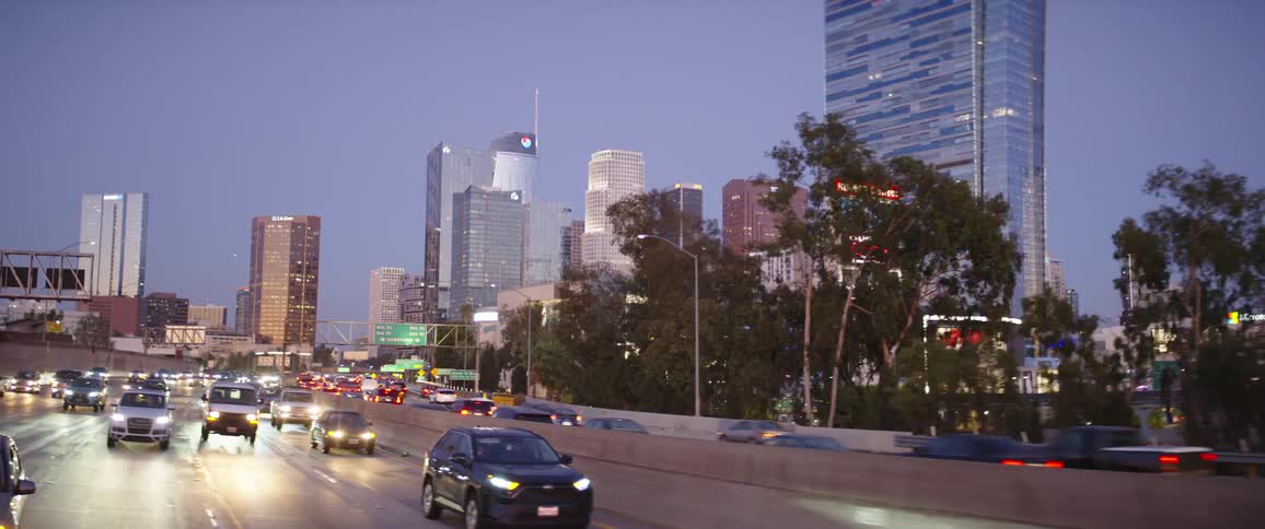 Traffic on a highway on the city at evening
