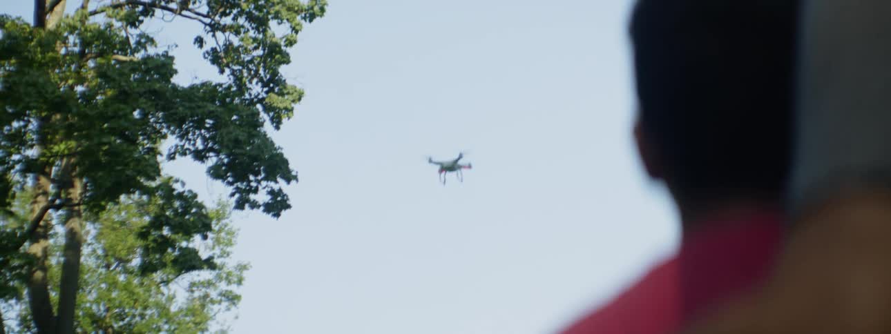 A drone flying around in the sky