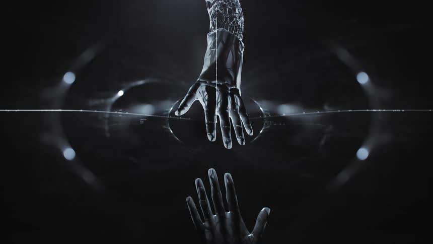 A hand reaching for a robotic hand