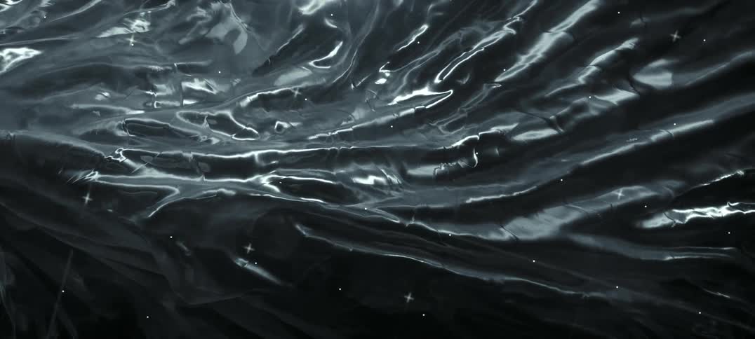 A silver liquid coming into focus