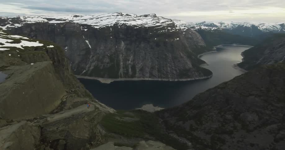 View from the top of a mountain range on a cloudy day