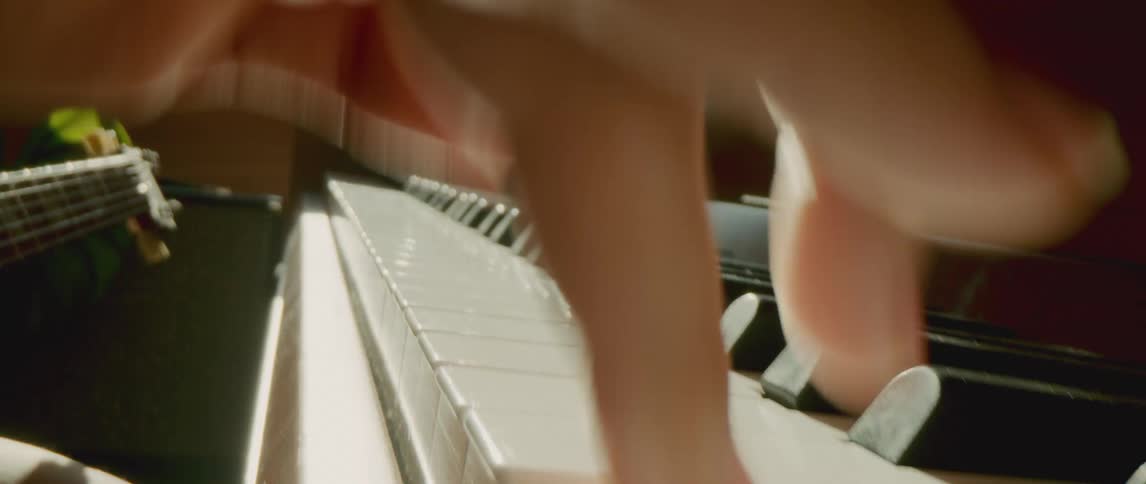A person is playing the piano