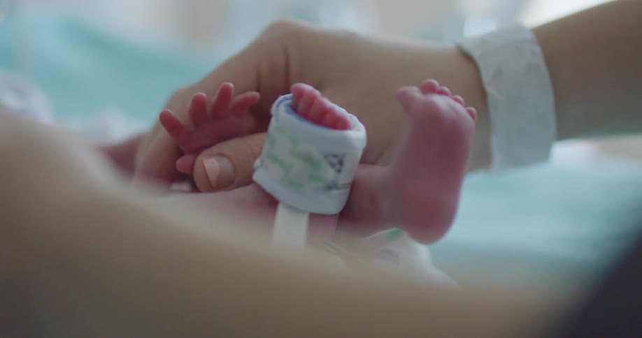 A person tending to a baby