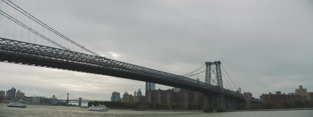 The williamsburg bridge is suspension bridge in new york city across the east river