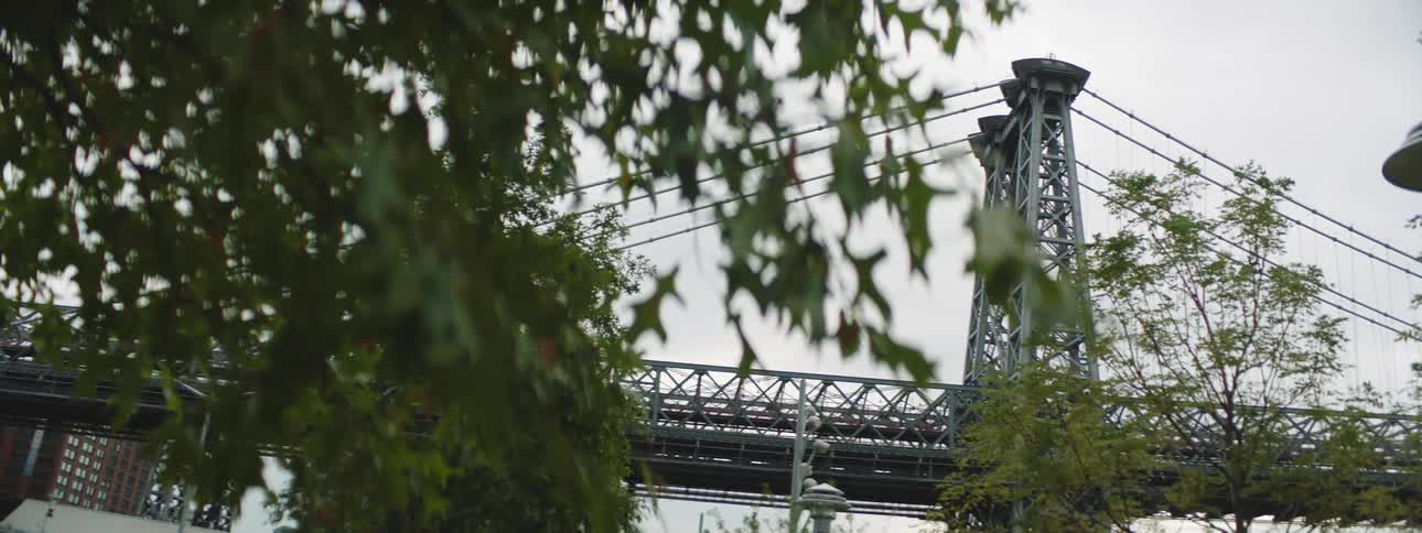 The williamsburg bridge suspension bridge in new york city across the east river