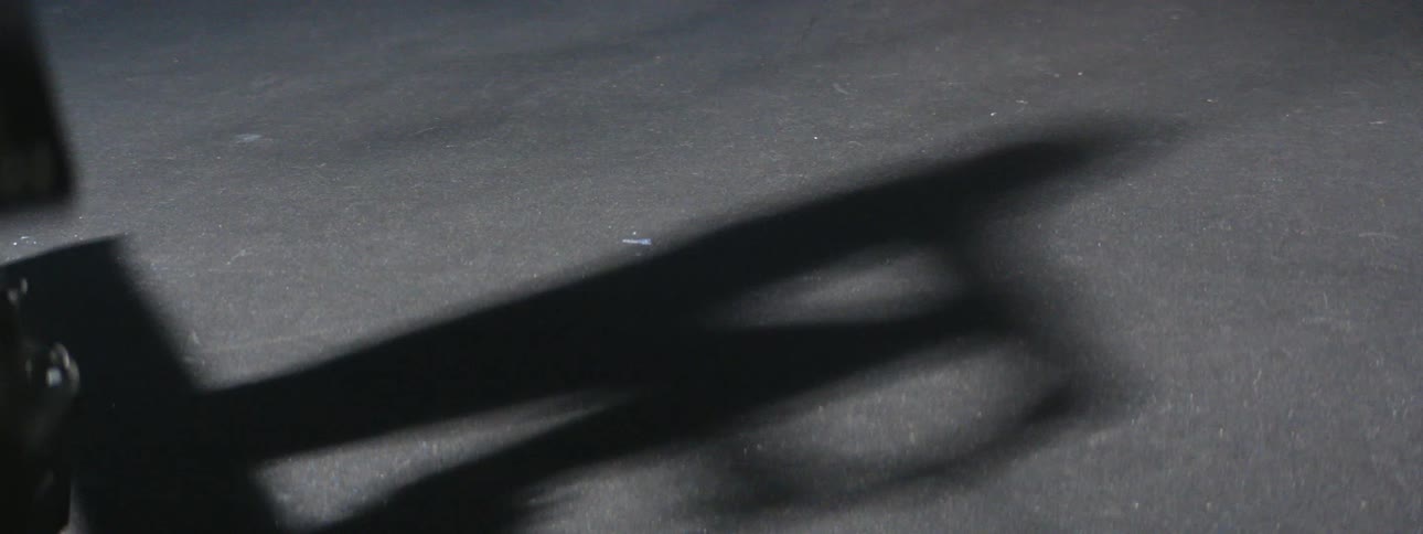 A shadow of a person working out