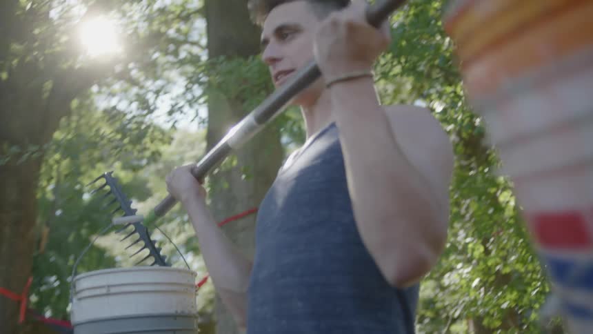 A man working out with homemade weights