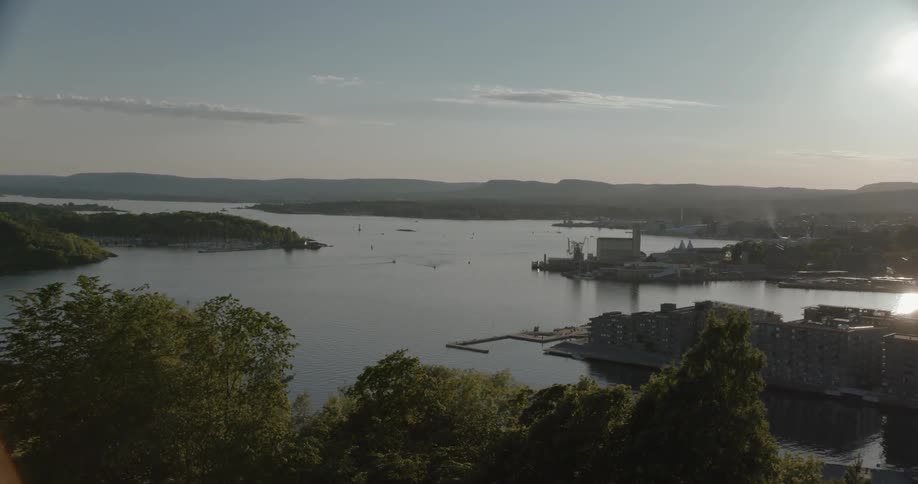 View of a town near the shore at sunset