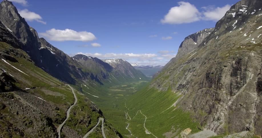 View of a mountain range with grass below