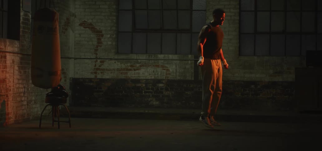 A man is jumping rope indoors