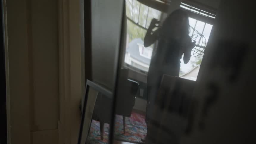 Woman moving furniture