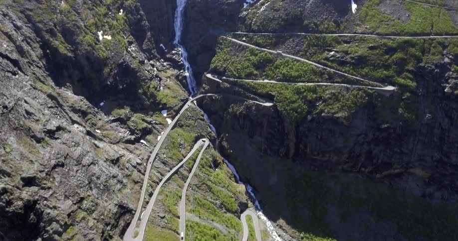 A road winds up a mountainside